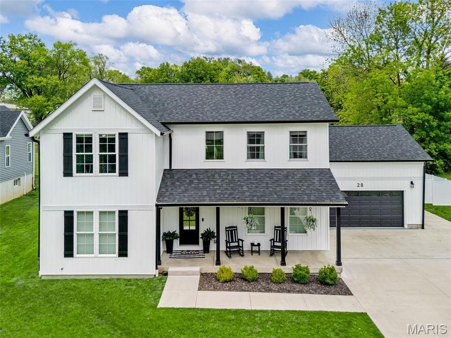 Luxury living in this stunning, better-than-new 1.5-story home, thoughtfully designed by renowned architect Jeff Day & Associates. Featuring 5 bedrooms, 4.5 baths, and over 4,700 sqft of impeccable craftsmanship - this home offers elegance, comfort, & modern convenience.

Step inside to find a spacious living room with a cozy fireplace, complemented by an office or formal dining room—you decide! The gourmet kitchen is a chef’s dream, boasting KitchenAid stainless appliances, quartz countertops, stylish 42” cabinets, tile backsplash, and a convenient pot filler.

The expansive main level primary suite is a true retreat, complete with a walk-in closet and a spa-like bath featuring a double vanity, soaking tub, and separate shower. Upstairs you'll find a loft area, large bedroom with walk in closet and en suite, two additional generous size bedroom and an additional full bathroom.

The finished lower level extends the space and luxury with a fifth bedroom, full bathroom, large rec room, and a bonus room/sleeping area with custom built ins. 

Throughout the home, thoughtful details shine— Pergo Flooring, custom millwork, energy-efficient honeycomb shades, custom barn doors, upgraded designer tile in every bath, spacious walk-in closets, and chic lighting choices.

Outside, enjoy a fully fenced yard and concrete patio, ideal for entertaining. An oversized garage already wired for your EV Charger completes this exceptional property.

Don’t wait—this luxurious home won’t last!