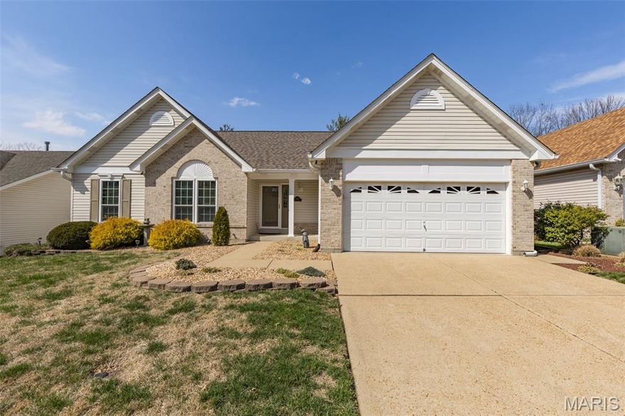 This stunning 4 bed, 2.5 bath home delivers the perfect blend of style, space, and comfort! Step inside to an open floorplan highlighted by soaring ceilings and beautiful hardwood floors throughout most of the main level. The spacious, updated kitchen features granite countertops, stainless steel appliances, tiled backsplash, pantry, and vaulted ceilings—perfect for both everyday living and entertaining.
The dramatic family room showcases soaring ceilings and a cozy gas fireplace with brick hearth and surround, creating a warm and inviting gathering space. Just off the kitchen, the bright breakfast room opens to a covered composite deck with vinyl railing overlooking a private backyard—ideal for relaxing or hosting guests. The main floor also includes convenient laundry with tile flooring and a formal dining room for special occasions. The luxurious primary suite offers a bay window, vaulted ceiling, walk-in closet, and spa-like bath with jacuzzi soaker tub, separate cultured marble shower, and double bowl vanity.  The partially finished lower level provides incredible flexibility with two walk-out areas, a half bath, large 27x32 recreation room and abundant storage. Situated on a quiet cul-de-sac with a 2-car garage, partial brick front, and beautiful landscaping in both the front and rear yards. The 4th bedroom currently serves as a flexible bonus space—perfect for an office, playroom, or guest room.  In addition, there is outdoor patio space plus a fenced backyard.  This is truly a must-see home that combines comfort, elegance, and functionality!