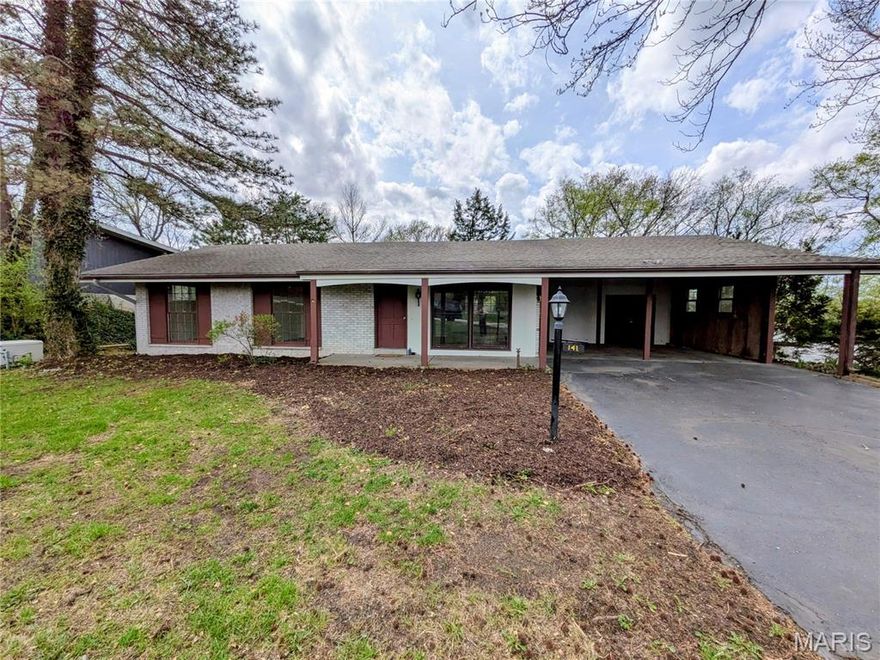 Welcome home to your dream oasis! This beautifully remodeled 4-bedroom, 3-bath home is ready for you to make it yours. With stunning new flooring, modern light fixtures, and a completely updated kitchen featuring stainless steel appliances and quartz counters, every corner of this home shines.

Imagine sipping your morning coffee on the covered top floor patio or entertaining in the spacious walkout basement, complete with a rec room and an additional bedroom and bathroom. The beautiful yard and roomy carport with a storage shed add to the charm. Plus, you’ll love the peace of mind that comes with a newer Generac generator!
**NEW ROOF COMING SOON!!** THE YARD HAD SOME UPDATES AS WELL. TREE IN FRONT OF HOME WAS REMOVED ALONG WITH SEVERAL BUSHES, FRESH MULCH IN FRONT AND BACK.
**SELLER IS OFFERING A HOME WARRANTY**