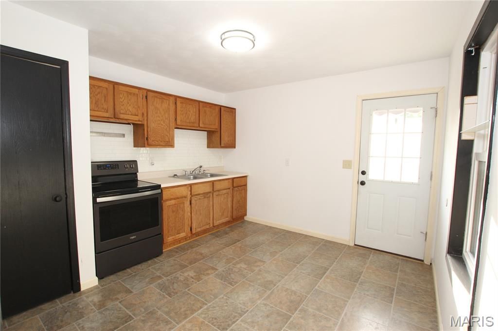Photo of 704 E Mortimer Street, New Florence, MO 63363 (MLS # 26027271)