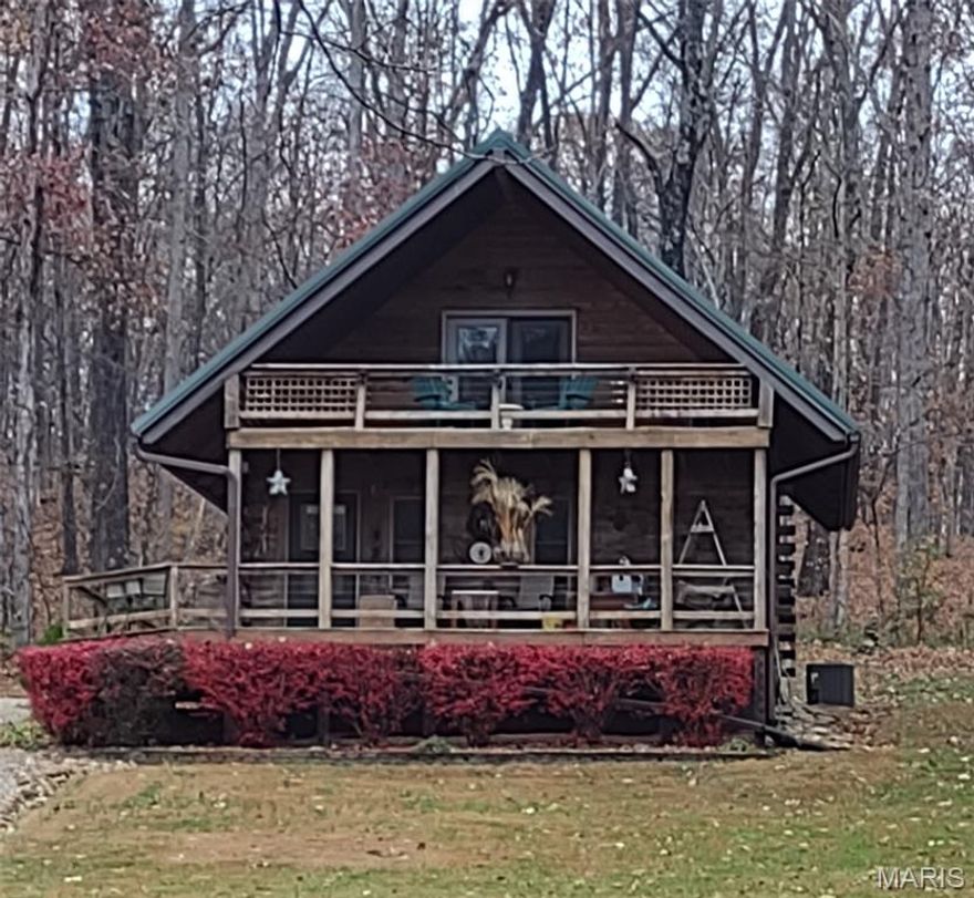If you have ever dreamed of owning a cabin in the woods, make sure to check out this cedar log beauty, resting on 20.26 acres.! House is total electric with granite counter tops, includes all appliances. Brand new, never used washer/dryer and the upstairs can accommodate 2 beds very nicely! HVAC is only 1 year old, has new vapor barrier, plus heat tape, new garage door, garage door opener and new lighting. Approximately 3 acres are cleared, and the remaining 17 acres are ready to be hunted! In addition, there is a 40x42 outbuilding/garage with a half bath, a 12x40 screened-in porch, a carport on one side and a 12x40 open-ended machinery shed. Get a jump-start on your house hunting for 2026! Property has been surveyed. Seller is offering a Home Warranty.