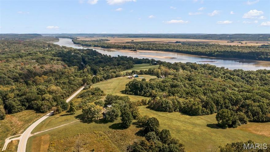 70 +- Acres of the most unique & rare properties to be offered to your family. 60 % rests elevated overlooking Missouri's awesome scenery that is highlighted with a phenomenal view of the Missouri River. Incredible mix of acreage that includes heavy woods, clear & open spaces. The balance of the property is heavily wooded river bottom land with 1000' +/- of Missouri River shoreline.  Absolutely a hunter paradise to include duck and you pick the animal hunting and fishing. Also a very special bonus to horse lovers with  direct access to the Katy Trail with 15 miles of riding from Portland to Tebbetts. The "Icing on the Cake" is a very special custom built, 8 years new, 1 1/2 story home featuring 4 bedrooms (plus sleeping room), 4 baths, vaulted Family Room, custom open Kitchen with home framed with a 8 x 24 front porch and extensive back deck. along with an in creditably large fenced back yard. Truly a MUST SEE.