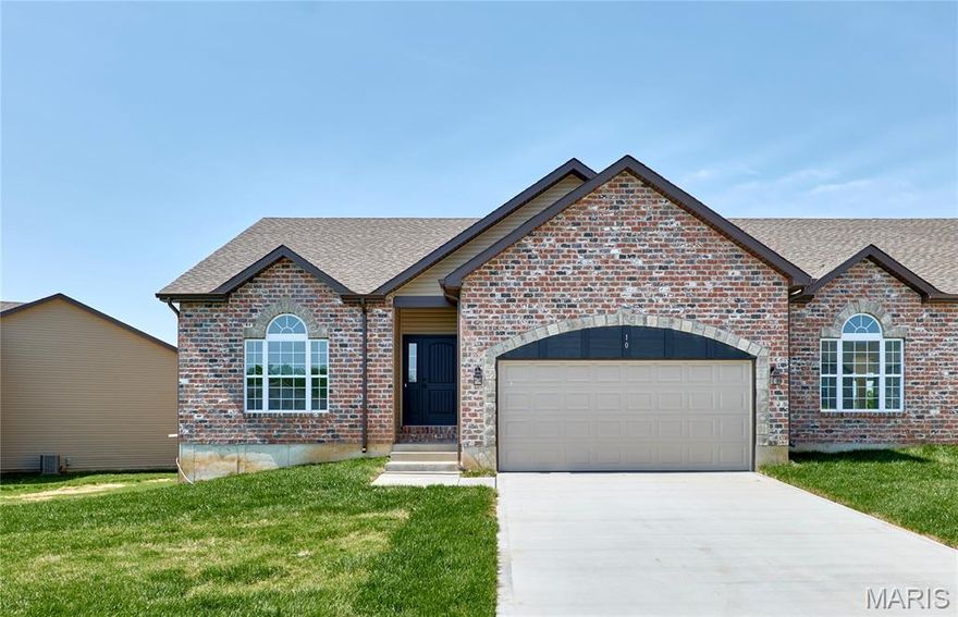 New Construction villa with over 2650sf of living space in Moscow Mills. Stunning brick & stone elevation exterior w/ delightful architecture features inside the home. Main floor has 9' tall ceilings w/impressive great room, vaulted ceiling, beautiful fireplace. Laminate flooring throughout great room, breakfast room & kitchen. Enjoy cooking in a lovely kitchen featuring custom cabinetry, huge island, solid surface counters, SS appliances opening right into the bright breakfast room. Spacious master w/vaulted ceiling, large master bath w/separate tub, shower, dual sinks & spacious walk-in closet. Also on main level a nice sized additional bedroom, full bath, laundry area and covered deck. Lower level lookout is finished with large recreation room, additional bedroom and full bath. Great location, minutes from Hwy 61 & Hwy 47!