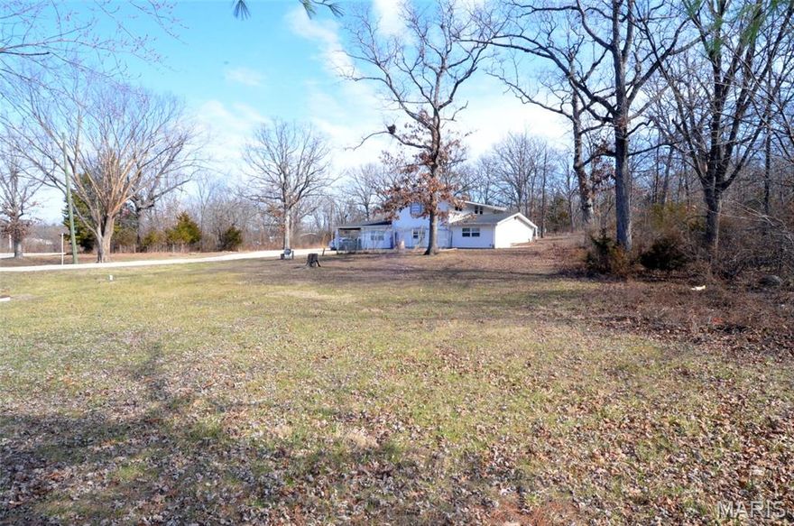 Discover this beautifully updated property offering incredible flexibility with a flat, cleared yard; there’s plenty of space for outdoor enjoyment, parking, or future expansion. Step inside to find many modern updates throughout, giving you the comfort of move-in readiness while still leaving the opportunity to add your own personal touch with paint colors or design choices. This property offers the ideal balance of potential, convenience, and charm. Newer carpet and vinyl floor, installed September 2025. This 3-bedroom, possibly 4, offers 2 full baths and an attached 2-car garage. The lower level is handicap accessible and has been completely rehabbed from the floors to the ceiling with a newer foundation, piers, trusses, and subfloor in 2022. Newer electric wiring throughout the house, 2022, Newer kitchen & bathrooms 2022-2024. The upstairs has been plumbed for a kitchen, which could be a great space for a mother-in-law's quarters with a separate entrance. Upstairs has an additional 1 or 2 more bedrooms, office space, or an entertainment area. The roof was replaced in 2022. Enjoy the peace of country living without sacrificing convenience. The opportunities are endless! The property is just 8 miles from Meramec State Park, float trips, and close to HWY 44.  The Electric Company is with Crawford Electric Co-Op.  Home is located in Oak Grove Village!  Convenient location close to local amenities and attractions.