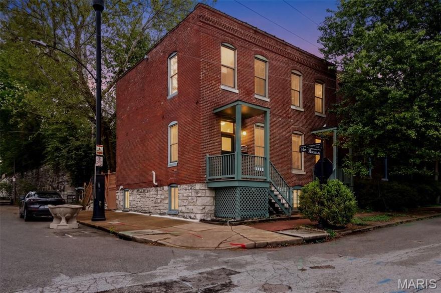 Nestled in Lafayette Square, one of St. Louis's most beloved neighborhoods, this two-story brick residence with a finished lower level delivers three bedrooms, two full bathrooms, a private courtyard, and dedicated parking – all within one of the city’s most historic + walkable neighborhoods!

Inside, 10-foot ceilings and oversized windows on a corner lot make the first floor feel bright and welcoming. The beautifully renovated kitchen (2024) features sleek Dekton countertops, custom cabinetry, and thoughtfully placed shelving that maximizes every inch of storage. From there, step out to the deck overlooking your private courtyard - perfect for morning coffee or evening entertaining. Head upstairs and you’ll find two bedrooms and spacious full bathroom. The lower level adds valuable living space with a private third bedroom and full bath - great for guests, a home office, gym, or flex space to fit your lifestyle.

Now the real dilemma… with a kitchen this gorgeous, will you ever want to eat out? Lafayette Square makes that decision tough. The stroll to Eleven Eleven Mississippi will be under five minutes, and you won’t believe how many STL hot spots you can walk to in under ten! Polite Society, Planter's House, Extra Wavy, Hamilton's Steakhouse, and don’t sleep on Vicini's handmade pasta (served only on weekends at lunch). 

Commuting is a breeze with quick access to I-44 and I-55, and there’s Target (and TopGolf!) just five minutes away. Juxtaposing those modern conveniences is stunning Lafayette Park itself. The oldest urban park west of the Mississippi, it features 30 acres of winding pathways, ornamental gardens, tranquil water features, and a playground.
Walk everywhere. Love where you live.