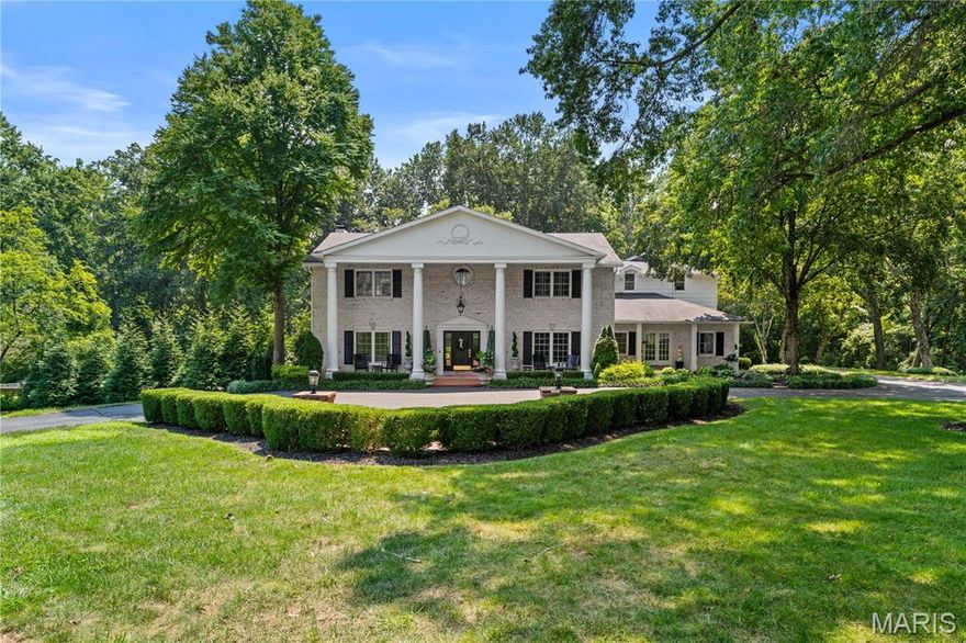 Nestled on a 3.56-acre park-like setting, this elegant home offers refined living inside and out. A dramatic two-story foyer with a grand staircase leads to formal living and dining rooms with detailed millwork and hardwood floors. The open-concept kitchen, breakfast area, and family room form the heart of the home. The kitchen has a La Cornue stove, Wolf and Sub-Zero appliances, refrigerator drawers, a Wolf wall oven, a Wolf microwave, a warming drawer, an In-counter Wolf steamer, and a center island. Full dish-and-light appliance room. Sliding glass doors open to a private patio, pool, and gazebo—perfect for entertaining. The spacious primary suite includes two walk-in closets and a bath with a soaking tub, steam shower, and dual vanities. Over the garage is a large bonus room ideal for an office or playroom. The finished lower level includes a wet bar, full bath, 1,600-bottle wine cellar, and walk-out access to the heated pool. Three-car attached garage, complete irrigation system & whole house generator. Enjoy privacy and tranquility in this premier gated community that backs to a 50-acre private equestrian property!