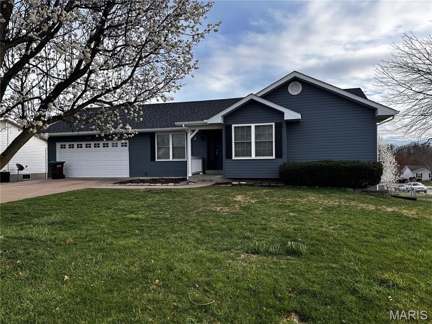 This beautifully remodeled ranch-style home in Troy, Missouri features an all-new exterior with fresh siding, roofing, windows, and doors for modern curb appeal. Step inside to discover a bright, open-concept layout with updated finishes throughout. The spacious yard offers both privacy and room to entertain. Located in a quiet neighborhood just minutes from schools and shopping, this turnkey home blends comfort, style, and convenience in one perfect package.