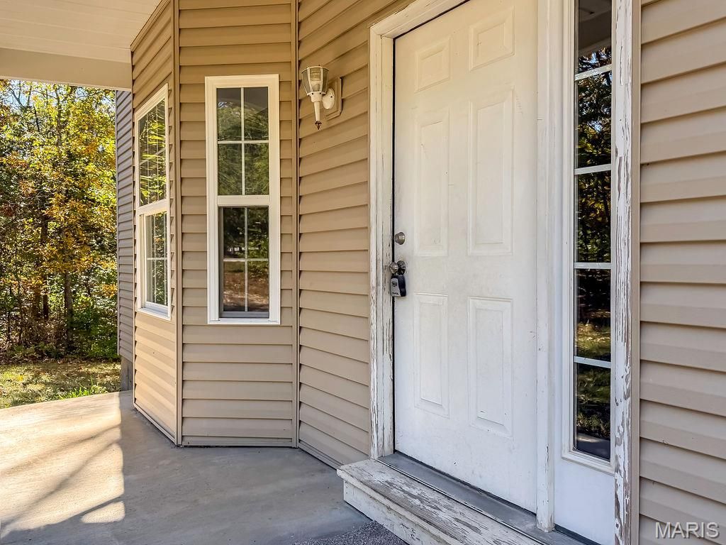 Photo of 7933 Medley Drive, Dittmer, MO 63023 (MLS # 25079316)