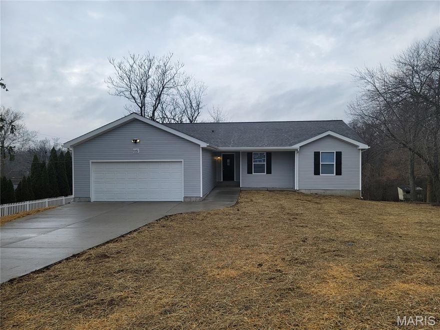 Brand new 3 bed 2.5 bath rach home on 1 acre lot with 2 car attached garage.  This home has a deck, walk out basement, high efficiency HVAC,  main floor laundry, island kitchen, and is sure to impress when you take a look.  Directly across the street from the Community center and park in a great part of town.