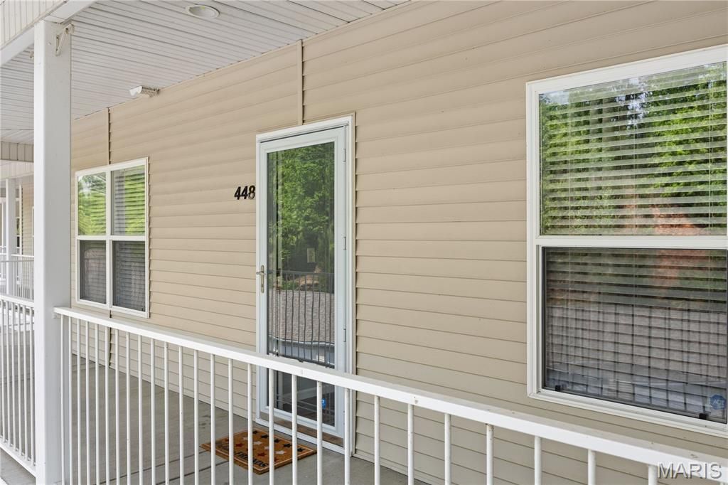 Photo of 18130 Millstone Cove #448, Versailles, MO 65037 (MLS # 26026268)