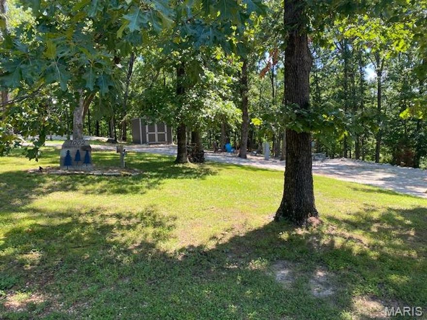 Lake Perry is the area’s favorite get away yet close to home! Enjoy the 200 acres spring fed Lake, swimming, boating and fishing. Lake Perry also offers an in-ground swimming pool, sandy beaches, playgrounds, bath houses, and a seasonal restaurant. This half acre lot is within walking distance to the swimming pool, has water and 2 electric hookups. The large circle drive is an added bonus to ease in the parking of your camper. There is a 10 x 14 shed with a reinforced floor to store all of your toys. Additional Rooms: In Platted Subdv.