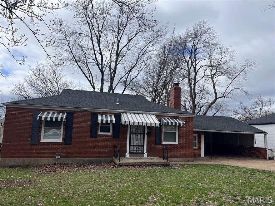 Wonderful Move in Ready Brick Home with Lots of Features to Love that include Hardwood Floors, Updated Kitchen and Bath, Woodburning Fireplace, 2 Car Carport, Covered Deck, Clean Basement & Bonus Room all at a Great Price!  The photos tell the Story but you really need to see this one right away!
