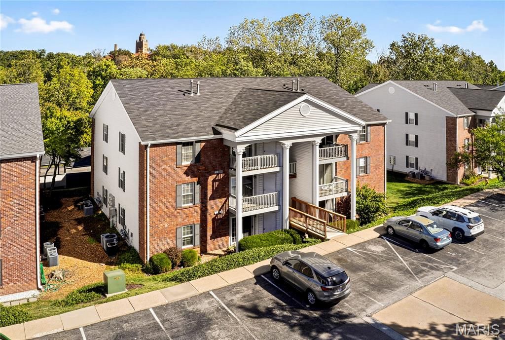 Photo of 7501 Triwoods Drive #J, Shrewsbury, MO 63119 (MLS # 25071114)