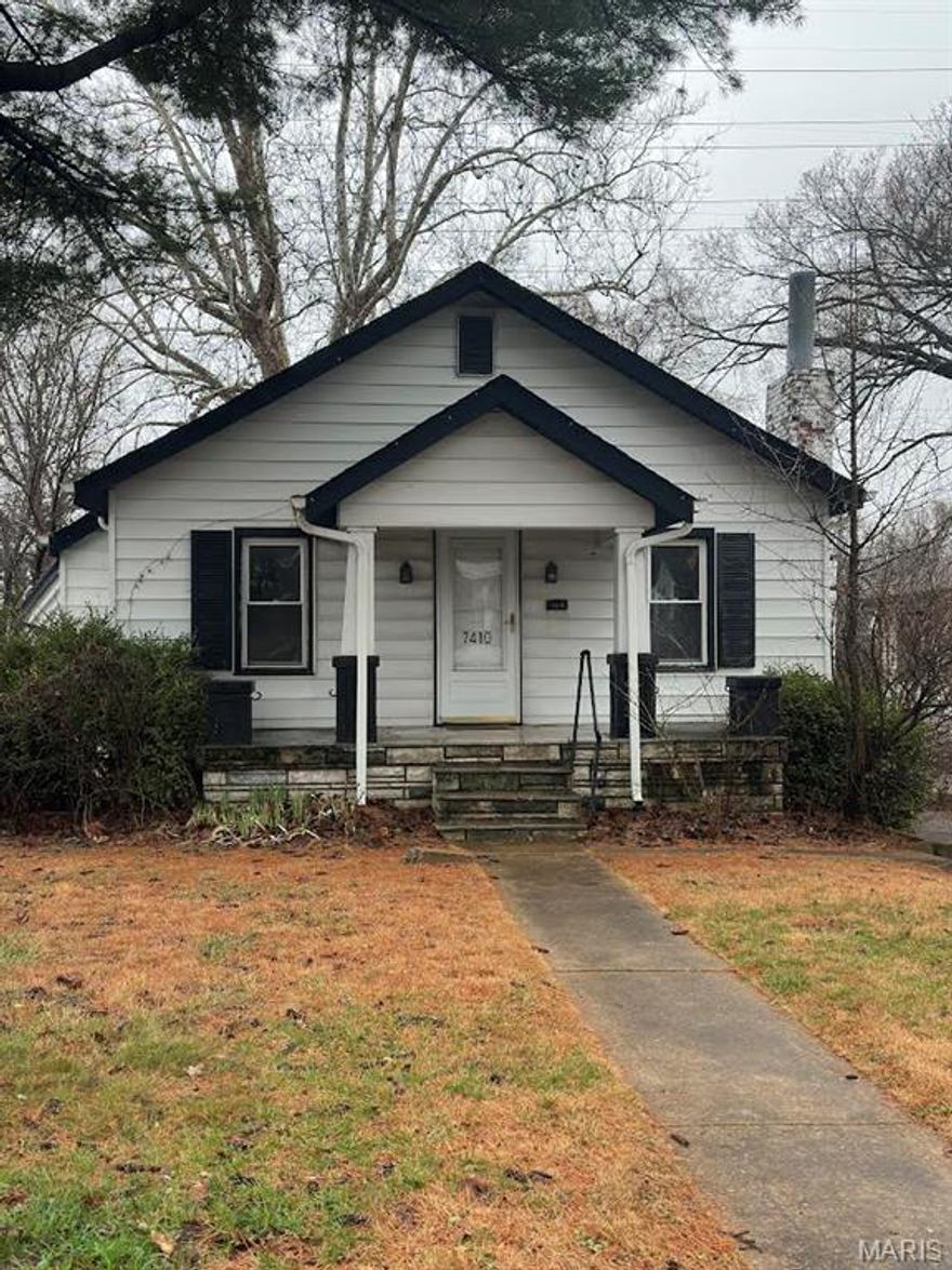 Opportunity awaits at 7410 Liberty Avenue in University City! This 3 bedroom, 2 full bath home offers great potential for buyers looking to make a property their own and take advantage of built-in sweat equity.  A welcoming front porch adds charm and a great place to relax and watch the world go by. Inside, you’ll find hardwood floors in the living room, separate dining room, and one bedroom, adding warmth and character to the space. The generously sized kitchen offers plenty of space and opportunity to design the kitchen of your dreams. The primary bedroom includes its own full bathroom, offering added comfort and convenience. Situated on a large lot, the property offers plenty of outdoor space along with a deck, fenced backyard and a two-car garage. You'll also benefit from several updates including a basement waterproofing system, 200-amp electrical panel, and a newer hot water heater. As an added bonus, there may also be the possibility of dividing the lot into two separate parcels, though buyers should verify feasibility and requirements directly with the City.  Located in the ever-popular University City, this home is close to many of the area's most vibrant destinations, including great restaurants, shops, and entertainment along The Delmar Loop. The property also offers convenient access to major highways and is just minutes from Washington University in St. Louis, Forest Park, and many nearby parks; Whether you’re looking for a project with great upside or a home you can personalize over time, this property offers space, flexibility, and strong potential in a convenient University City location. Being sold as-is, this home provides the chance to bring your vision and creativity to life.