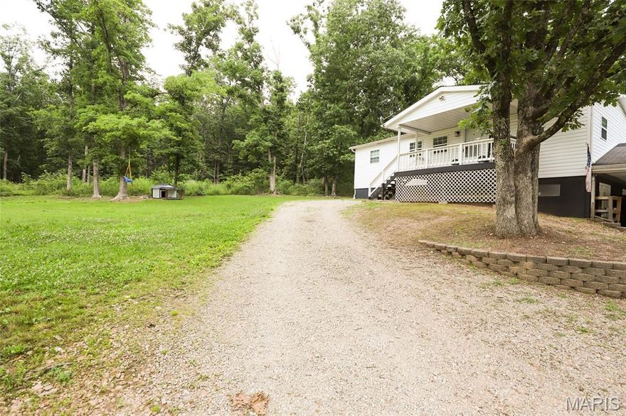 Tucked into a secluded setting on a private county road (Old Highway 67), this updated 3-bedroom, 2-bath home offers approximately 130± acres of a mix of open ground and wooded acreage. The property is conveniently located near Highway JJ and Highway 67, just south of Fredericktown, providing access to surrounding communities while maintaining a private setting.
The property surrounds 12 Mile Baptist Church, offering a recognizable location reference point. The acreage includes a pond suitable for livestock and recreational use.
The home features an open layout with granite countertops, a spacious primary suite, and a recently updated HVAC system for year-round comfort. The partially finished walk-out basement includes an additional lower-level bedroom with a large walk-in closet. The remaining unfinished space provides an opportunity for future expansion, storage, or recreational use.
The acreage offers flexibility for a variety of uses including livestock, hunting, and outdoor recreation. Located within reasonable driving distance to Mark Twain National Forest and St. Joe State Park, the property provides access to trails, public land, and outdoor activities.
Convenient access to Highway 67 allows for travel to nearby towns including Farmington and Park Hills.
If desired, the seller may consider offering the home with less acreage.
