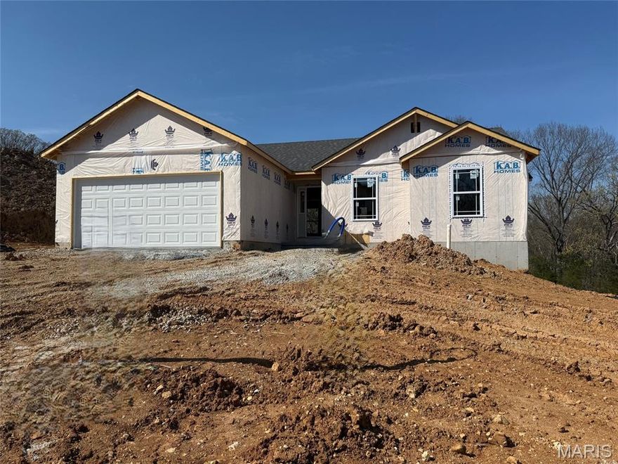 Welcome to Hawk Ridge Estates! Located off Hwy B & Brickyard Road. This new subdivision features 29 home sites with all back yards backing to woods. The To Be Built Walnut Model is a 3 Bedroom 2 Bath 1250 sq. ft. Ranch with main floor laundry and 2 Car Garage. The new homes come with quality standard features & have additional options to choose from! The photo is a previous built home & may show optional features. With this being a smaller community lots may sell quickly, hurry today to secure your dream home!