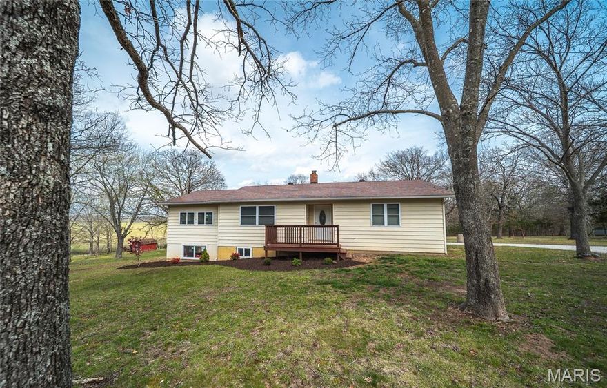 Welcome home to this charming 3-bedroom, 3-bathroom property nestled on 10 beautiful acres in the heart of the Ozarks. Conveniently located on all pavement and just a short drive from the amenities of St. James, this property offers the perfect balance of country living without sacrificing convenience.
Inside, you'll find a thoughtfully designed floor plan featuring a spacious primary suite, ideal for those seeking a private retreat at the end of the day. The finished basement adds valuable living space — perfect for a recreation room, home office, or additional entertaining area.
Major updates give buyers peace of mind: a new well pump (2025), new septic system (2024), and a new Culligan double water filtration system with UV light and softener (2025) ensure this home is move-in ready from the ground up. Inside the kitchen, new stainless steel appliances complete the package.
Step outside to a covered deck with views for miles, perfect for soaking in the beauty of the surrounding Ozark landscape.
Set within the well-regarded St. James School District, this property is a wonderful option for families looking to put down roots in a welcoming community. Situated in Maries County, you'll enjoy the peace and quiet of rural Missouri living while remaining close to local shopping, dining, and services in town.
With 10 acres at your disposal, the possibilities are endless — whether you're dreaming of a hobby farm, space for horses, or simply room to roam and enjoy nature. Don't miss your chance to own a slice of Missouri countryside with all the right features in all the right places.