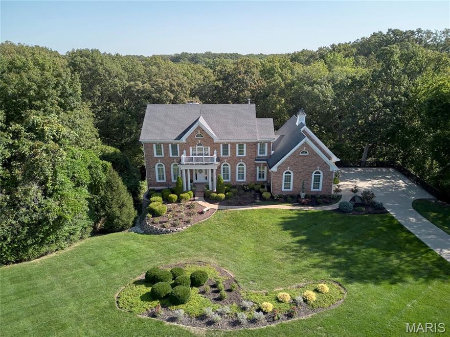 SHOWINGS START FRIDAY 2/27 ... SIMPLY IMPRESSIVE DESHETLER BUILT HOME WITH SIGNATURE QUALITY WORKMANSHIP AND WOODWORK SITTING ON A 1.23 ACRE LOT CONVENIENTLY LOCATED IN KINGSPOINTE! Beautifully appointed with massive moldings, arched openings, oversized spindles, casing, job-finished hardwood flooring, built-in bookcases, re-designed cabinets with custom mullions, paneling, three gas-logged fireplaces, oversized side entry garage finished with epoxy flooring, newly painted interior, updated lighting fixtures and more. The fine details speak for themselves but the condition of home is move-in ready. The spacious sunlit kitchen features Viking appliances, a Sub-Zero refrigerator, granite countertops, a ceramic tile backsplash, a gracious amount of cabinets, a large island and a skylight.  The primary bedroom is dressed with an updated bathroom, wood flooring and a fireplace. Three additional large bedrooms have one with a private bath and one with an adjoining full bath. Lower level is just as inviting as the other levels with 9ft ceilings, a large billiards room, a full walk-behind bar loaded with cabinetry and full refrigerator and wine fridge, a TV area with large screen and projector (included) and fireplace, a 5th bedroom with a full bath, egress and two closets, and still enough storage area with shelving. Zoned HVAC and 75 gal water heater. LOVELY LANDSCAPE AND SERENE WOODED VIEWS! ENJOY YOUR TOUR