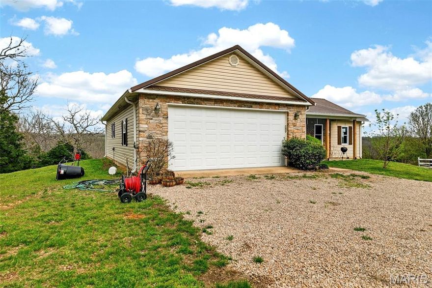 This property truly has it all—acreage, water features, and versatile living spaces all in one incredible setting. Situated on 60.8 picturesque acres, this property offers a rare opportunity for farming, recreation, or multi-generational living.

The main home features a 3 bed, 2 bath ranch layout with an attached 2-car garage, offering comfortable, single-level living. In addition, a detached 3-car garage includes a fully equipped apartment above complete with 1 bedroom, 1 bath, full kitchen, and private laundry, making it ideal for guests, rental income, or extended family.

The land is perfectly suited for agricultural use with ample pasture for livestock, along with a stocked 2/3-acre pond and an additional pond for cattle. Whether you're looking to raise animals, start a hobby farm, or simply enjoy wide-open space and privacy, this property delivers endless possibilities.

A rare combination of functionality, income potential, and natural beauty—don’t miss your chance to own this exceptional piece of Missouri countryside.