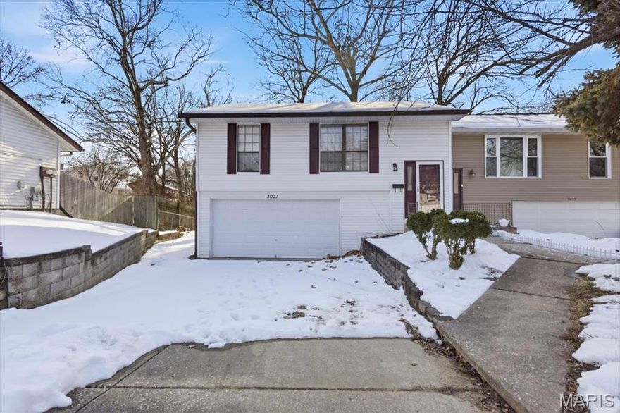 Welcome home to your 2 bed, 2 full bath, spacious home located in St Charles. This home features a 2 car garage, plenty of parking, spacious back yard and located in a cul-de-sac. As you enter the home notice the vaulted ceilings in the large family room, neutral paint colors throughout and natural lighting. Kitchen includes plenty of countertops, cabinets, space for entertaining that walks out to your deck. Walk in pantry. Eat in kitchen looking into family room. 2 spacious bedrooms upstairs with a full hallway bath. Enjoy your walkout basement with a wood burning fireplace, spacious family room and entertainment room. Full bathroom and laundry room. Enjoy your mini bar with cabinets and sink. Outside enjoy your quiet living space with a covered patio, partial fencing, chicken coop and plenty of back yard space.