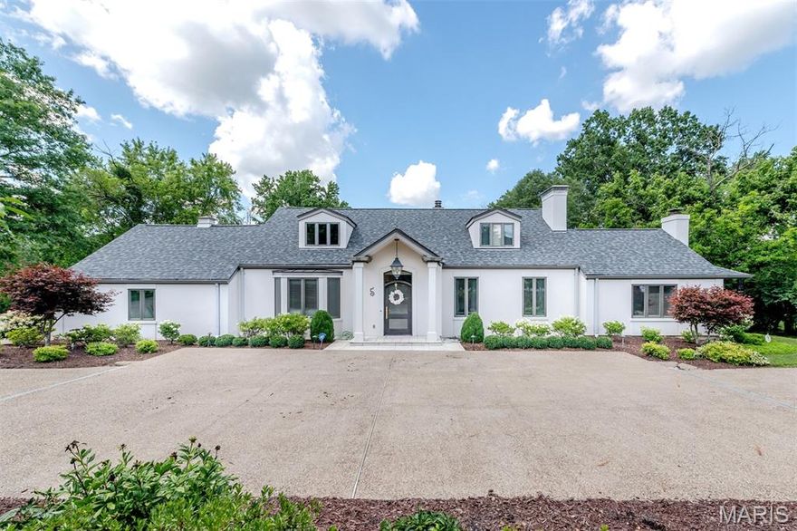 Welcome to 5 Huntleigh Downs Rd, a 1.5 story luxury home situated on a 1.18-acre lot in sought after Frontenac. Chef's kitchen w/custom cabinetry, granite countertops, huge center island, Wolf & Sub Zero appliances, including gas range oven w/exterior vented hood. Spacious open floor plan includes living room w/wood burning fireplace,  separate dining room, family room w/wood burning fireplace, breakfast room, office w/gas fireplace, mudroom, laundry room & main floor master suite, w/2 separate bathrooms w/a soaking tub, walk-in shower & 2 huge walk-in closets. 3 more large bedrooms with full bathroom on the 2nd floor. Finished walkout basement w/a large entertaining area w/fireplace & full bathroom; plenty of storage including HUGE walk-in cedar closet. 2 car side entry garage with additional parking along the circle drive! Expansive, park-like, private back yard with multi-level patio, & shed. Irrigation system. AAA Ladue Schools (Conway Elementary). Easy access to Hwys 270, 40 & Lindbergh. Close to libraries, Plaza Frontenac, shopping, & dining. Schedule today!