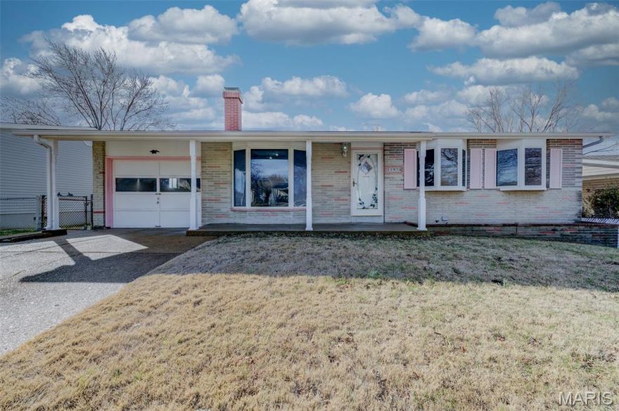 Soo much to offer in this GREAT, Original Owner, LOVELY ranch home with over 1,800 sq ft of living space! Walk into the HUGE, open family room with Beautiful hardwood flooring, floor to ceiling stone fireplace, and bay window! The kitchen offers beautiful, updated Maple Cabinets and a large eat in area with loads of natural light and a slider door that walks out to the AMAZING brick back patio with pergola! The primary bedroom has its own bay window with charming window seat! Second bedroom and full bath with Tub finish off the main level! The finished lower level offers tons of additional space with TWO very Spacious bonus rooms (both with closets and built ins) and one with an attached second FULL BATH! Large Rec room for entertaining, playing, office, etc!  Outdoor space is great with a large patio with pergola structure (ready to be converted to covered patio if preferred), large, flat, fenced yard, Garage and oversized driveway!  Freshly Painted throughout! Passed Municipal Inspection Available! And Yes, your seeing it right, the exterior of this house is not afraid to show a little personality (a little pink never hurt anybody)! But... very easy to customize if you prefer another shade!