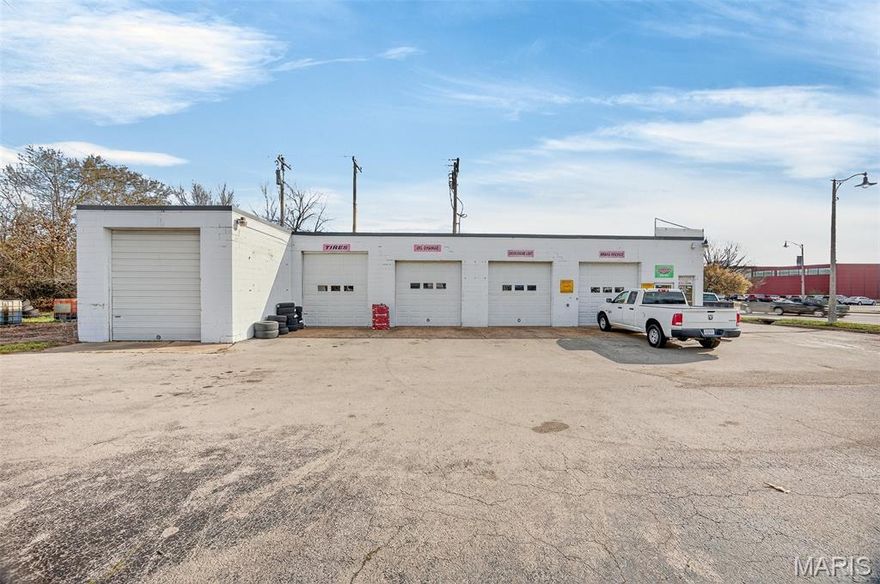 Location, location, location! This solid block commercial building offers incredible visibility and access on Elm Street, sitting on nearly half an acre. Currently tenant-occupied, this property is an excellent investment or owner-user opportunity with immediate income potential. Features include five drive-in bay doors, fenced outdoor storage, paved parking, and a functional interior layout with a welcoming reception area, private office, and restroom. The lot provides easy access and ample space for operations, parking, or future expansion. Opportunities like this—priced to sell—don’t come around often! Ideal for contractors, service businesses, or investors seeking a centrally located property with strong long-term value.