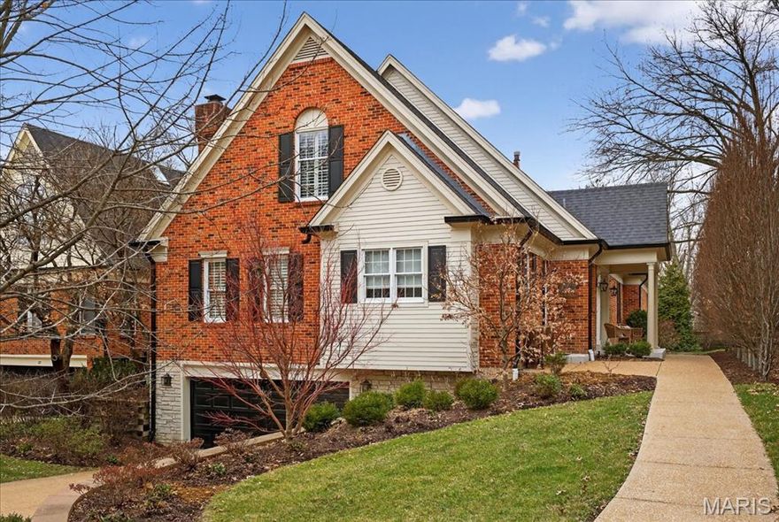 Ideally located in the heart of Ladue and within walking distance to shops and restaurants, this beautifully maintained single-family home offers an exceptional blend of comfort, style, and convenience. The spacious open floor plan is highlighted by rich hardwood floors, a welcoming hearth room with fireplace and wet bar that flows seamlessly into the dining room, and a well-appointed kitchen with an adjoining laundry room—perfect for everyday living and entertaining. The inviting living room features a fireplace and French doors that open to a private outdoor courtyard, creating a serene retreat. The generous first-floor primary suite includes an adjoining sitting room, ample closet space, and a spa-like bath designed for relaxation. The second floor offers two additional bedrooms and a full bath, complete with an oversized shower and double vanity. An oversized, heated two-car garage provides a work area and abundant storage . The lower level features a large open basement with a finished recreation area, exercise room, full bath, and multiple storage rooms, including a secured storage area. Beautifully cared for and thoughtfully designed, this home offers a maintenance-free, turnkey lifestyle in one of Ladue’s most desirable locations.