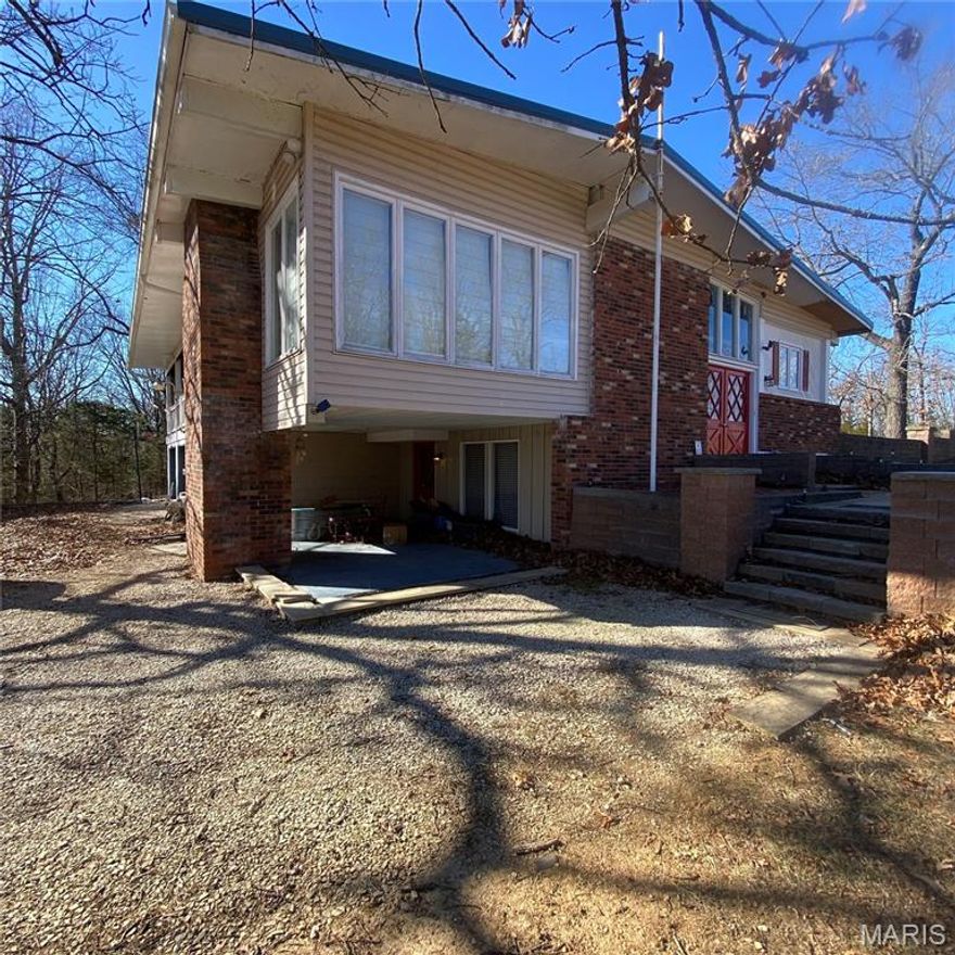 Welcome home to this spacious 5-bedroom, 3-bath residence situated on a desirable corner lot with a generously sized yard. This home offers a functional layout with ample room for living, entertaining, and everyday comfort. Enjoy the large covered porch—perfect for morning coffee or relaxing evenings—while taking in the peaceful surroundings. The expansive lot provides plenty of space for outdoor activities, gardening, or future enhancements. With abundant bedrooms, multiple bathrooms, and great curb appeal, this property offers flexibility and room to grow in a sought-after setting.