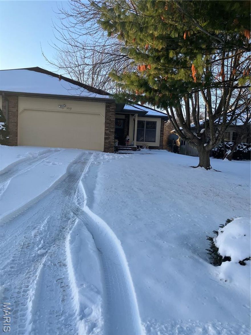 Income-producing duplex with two bedrooms and two baths per unit. Attached two-car garage adds tenant appeal and functionality. One unit rented with long time tenant for $900/m.