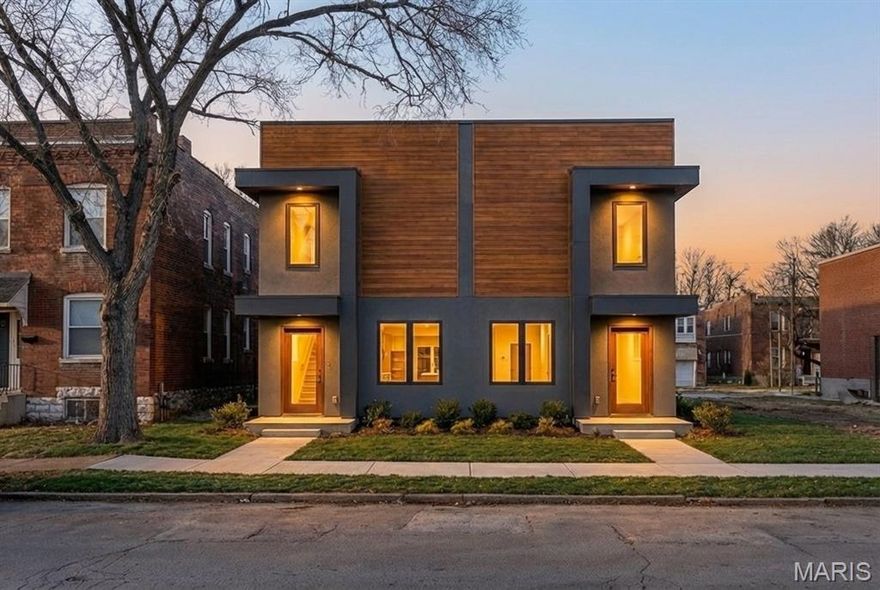 Introducing a brand-new construction townhouse in the heart of Old North St. Louis, blending modern design with one of the city’s fastest-growing neighborhoods. This 3 bed, 2.5 bath home features LVP flooring throughout, sleek matte black fixtures and hardware, custom cabinetry with island seating, granite countertops, and stainless steel appliances for a clean, contemporary feel. The spacious primary suite offers a private retreat, while second-floor laundry adds everyday convenience. Bathrooms feature stylish, cohesive finishes, and a rear parking pad provides off-street access with the option to add a one-car garage. Located near Crown Candy Kitchen, NGA, and ongoing development, this home offers both lifestyle and long-term upside. Don’t miss your chance to be part of the momentum in Old North St. Louis.