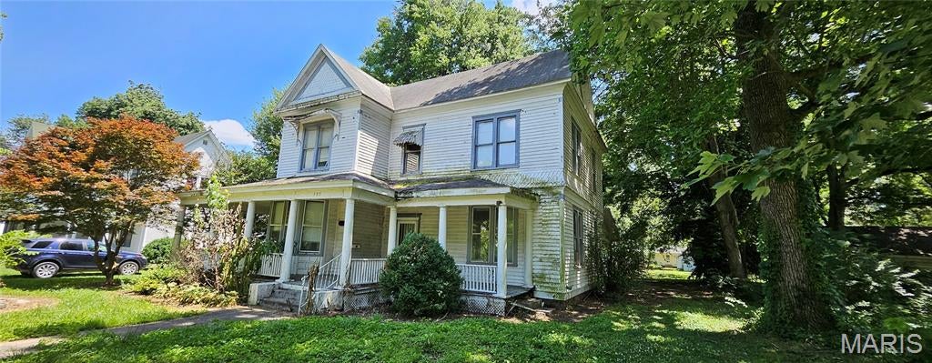 Photo of 305 Cypress Street, Charleston, MO 63834 (MLS # 26038065)