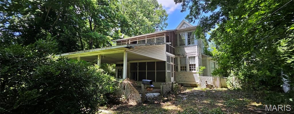 Photo of 305 Cypress Street, Charleston, MO 63834 (MLS # 26038065)