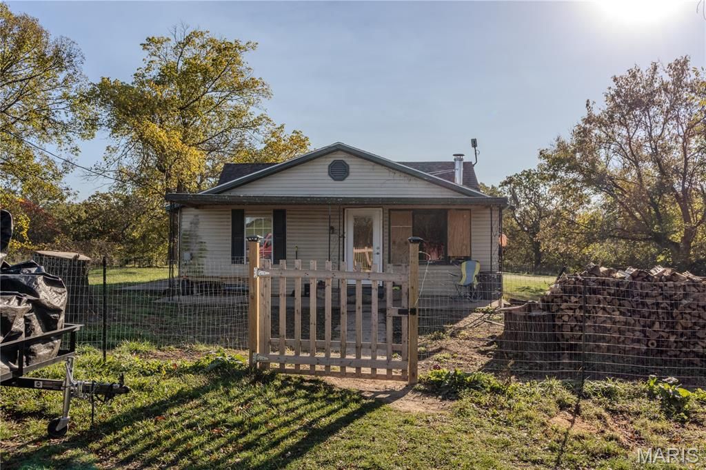 Photo of 49 Bennett Road, Iberia, MO 65486 (MLS # 25069997)