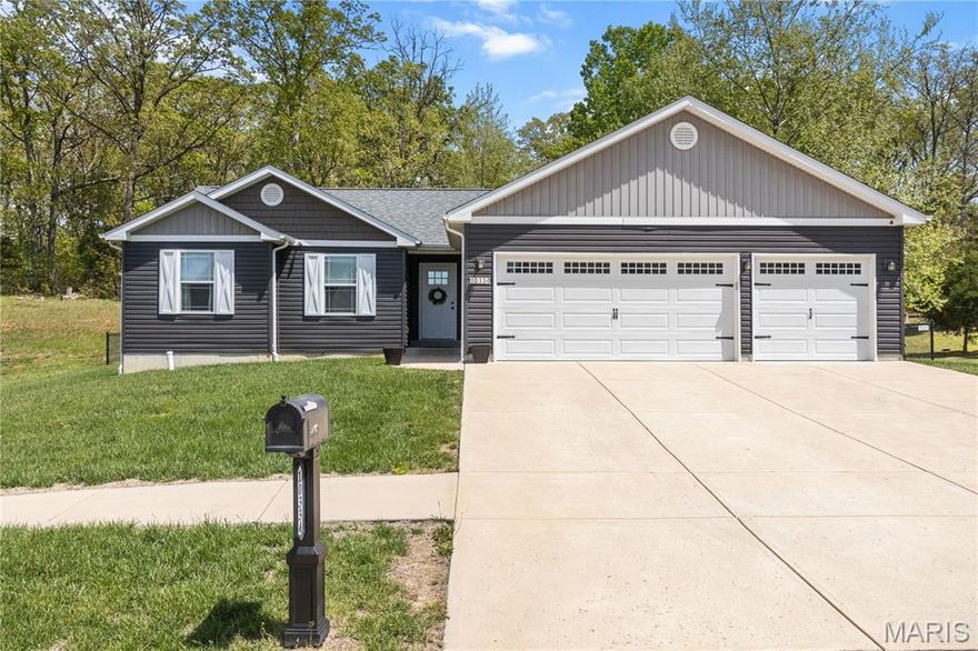 Welcome home to this beautifully maintained, move- in ready ranch offering both style and functionality! This inviting property features a spacious 3-car garage and eye-catching curb appeal with its modern palette, crisp white trim and charming covered entry. Step inside to discover a bright, open layout designed for comfortable everyday living and effortless entertaining. Outside, enjoy a well-kept yard with room to relax, play and entertain. The expansive driveway provides ample parking. Perfectly combining comfort, convenience, and style, this home is ready for its next owner to enjoy. Don't miss your opportunity to make it yours!