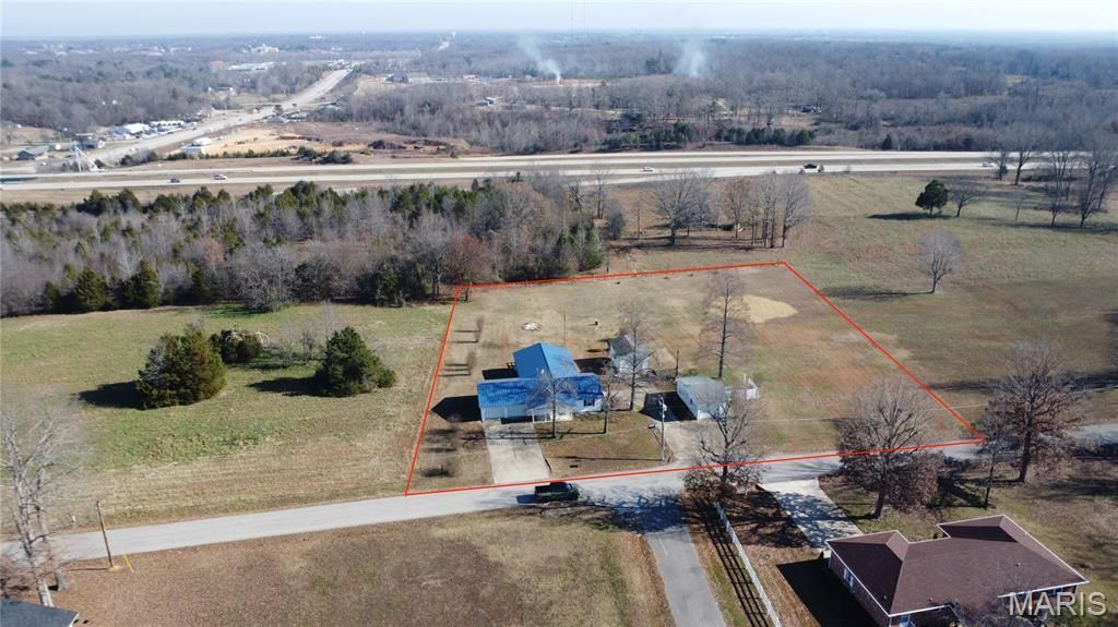Photo of 306 County Road 469, Poplar Bluff, MO 63901 (MLS # 25080230)