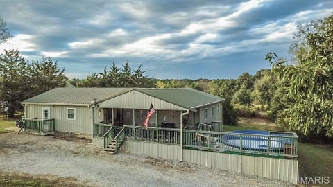 Photo of 20465 Monroe Road 455, Stoutsville, MO 65283 (MLS # 26059522)