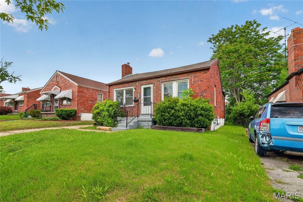 Photo of 1823 Eton Lane, St Louis, MO 63147 (MLS # 26026317)