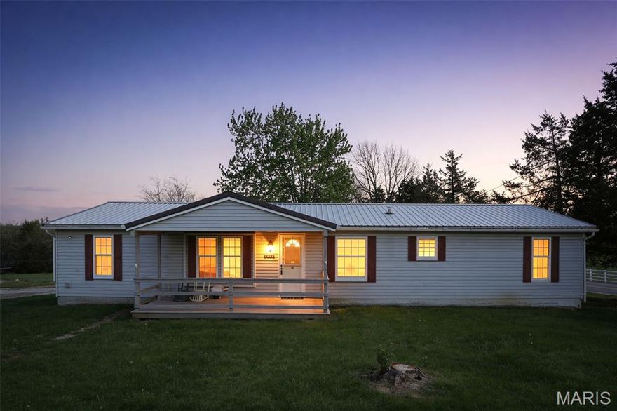 SPACIOUS 3 Bed, 2 1/2 Bath Home Located in a Great Area Out of Town! Living Room is Open to Dining Room, Kitchen has LOTS of Cabinets and a Breakfast Room. Family Room for Extra Entertaining! Primary Suite has a Garden Jet Tub & Dual Sinks. 2 Extra Bedrooms are Good Sized. 1/2 Bath Located by Back Door.  Covered Front Porch to Sit Back & Relax on. Need Room for Toys or Tinkering? 2 Car (30x40) Detached Garage with a Bonus 1 Car Detached Garage in the Back. Carport will hold your Camper & has Hook Up Ready. Nice Backyard with Blackberry & Grape Vines Ready for Summer! Call to See This Home Today!