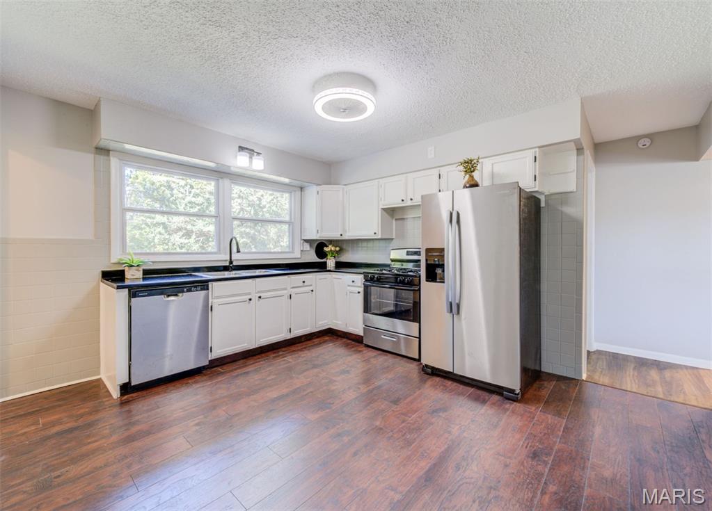 Photo of 23 Manor Drive, Florissant, MO 63031 (MLS # 26067002)