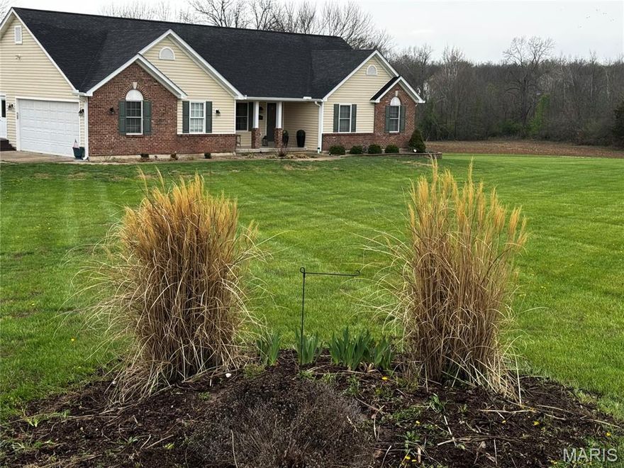 AMAZING family home in Southern Lincoln County with 2,900 sf of living space which includes professionally finished LL w additional 1200 sf .  3 bedrooms, 2.5 baths on main level with a full finished LL that has an additional bedroom, bathroom, family room and bar area .   Great open floorplan with many updates.  This is all siturated on 5 beautifully cared for acres that will include a pond, playset, chicken coop, firepit and more.  Large composite deck with half covered including tounge and groove vaulted accent ceiling to expand your living area.  Kitchen has full stainless steel appliance package, hard surface tops and a pantry.  Open floorplan works well for family living.   Primary bedroom is sized well and has a coffered cieling and luxury bath.  Beds 2 and 3 are perfect for the kiddos or guest.  Lower level has been professionally finished and is an outstanding entertaining area.  This home will be available for QUICK POSSESSION.