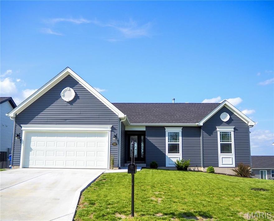 Welcome to this stunning open concept ranch in the sought-after Majestic Lakes! At almost 1,500 sq ft of living space on the main level, this 2.5-year-old 3-Bedroom, 2-bath home is filled with high end upgrades thru-out.  An upgraded front door greets you as you walk up to your new home.  Step inside to fresh paint, vaulted living room and kitchen with luxury vinyl plank flooring. The living room is filled with natural light from the 3 windows overlooking the vinyl fenced yard.  The spacious kitchen has upgraded cabinets, stainless appliances, quartz counters, and gas range. The primary bedroom features a tray ceiling, walk-in closet and a large bath w/double sink and black fixtures.  All 3 of the bedrooms have upgraded carpet.  You'll also love the convenience of the main floor laundry. The walk-out lower level is large and ready for your finishing touches, perfect for additional living space, adding a 4th Bedroom or a 3rd full bath.    Home is located on a quiet street that is a cul-de-sac.  NOTE:  Listing Agent is the mother of Seller.