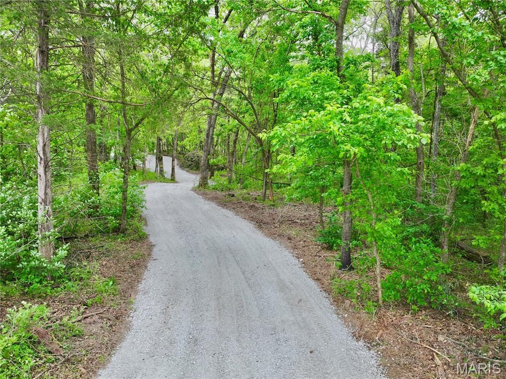 Photo of TBD SE 800 Rd. T25, Collins, MO 64738 (MLS # 26029098)