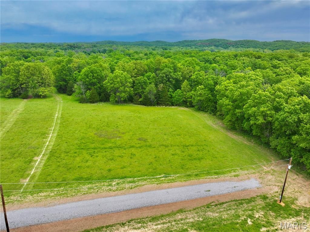 Photo of TBD SE 800 Rd. T25, Collins, MO 64738 (MLS # 26029098)