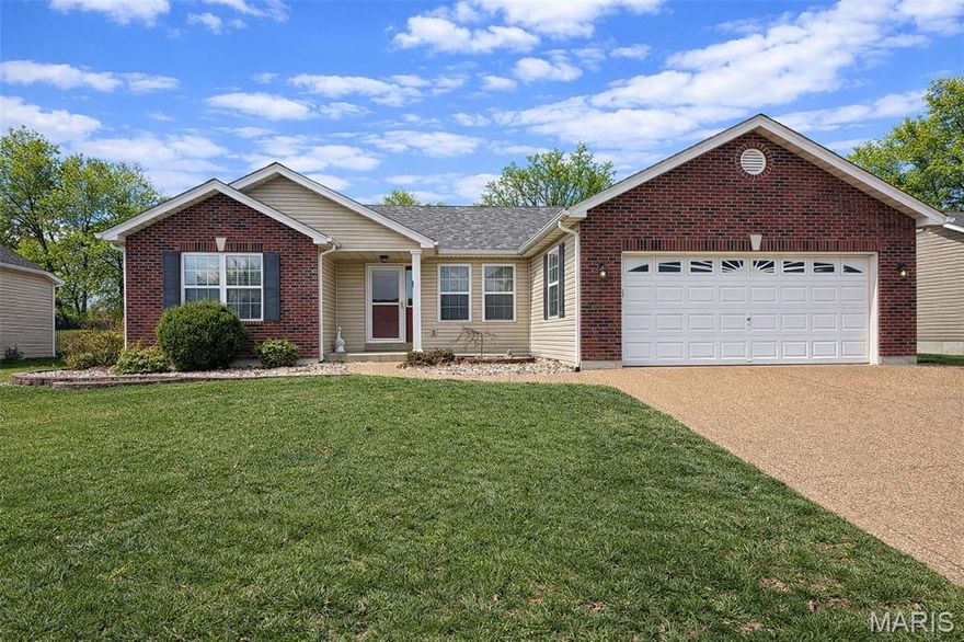 Welcome Home! This one is picture perfect and move in ready! A beautiful ranch with great curb appeal including mature landscaping and a brick front elevation. A huge backyard backing to common ground is complete with a simply amazing covered patio upgrade with roof extension, stamped patio, brick columns, fire pit that you have to see in person to appreciate!  The big backyard has a full privacy fence- perfect for pups and parties! Step inside to a bright, open main level featuring vaulted ceilings, hardwood flooring, and neutral paint. The kitchen offers great upgraded cabinetry and counters, updated appliances, including the refrigerator,  a breakfast counter, tile backsplash, built in pantry and flows nicely into the eating area with bay. The main level offers 3 bedrooms and 2 full baths. The primary suite is privately positioned and features a spacious bedroom, private bath with dual sinks and a walk in closet. Two additional bedrooms and a nicely updated full hall bath complete the main level. A dedicated main floor laundry room and oversized 2 car garage adds everyday convenience. The finished lower level significantly expands the home’s living space with a custom walk around stone bar, a large rec/billiards room (pool table stays!), plenty of entertaining space, a full bath and a sleeping room that can be used as a 4th bedroom, office, craft room or more!  Ample storage and a utility area round out the lower level. Settled in unincorporated Lincoln Country and located in Troy school boundaries- the is home is ready to go. Unpack your boxes and you are HOME!