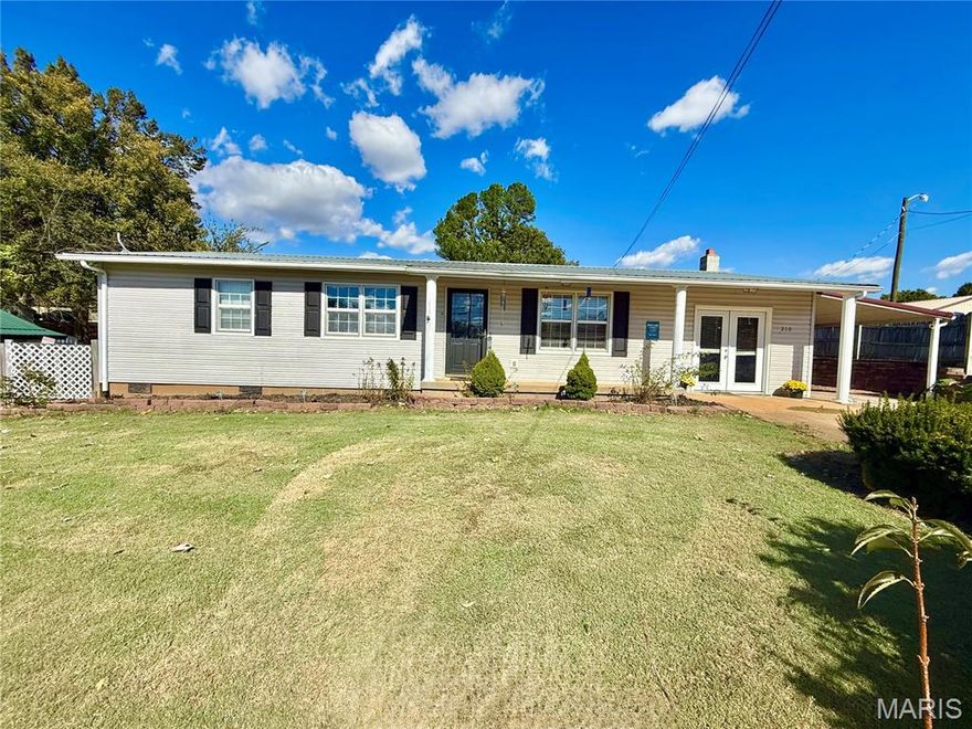 Welcome to this charming 3-bedroom, 1-bathroom ranch-style home located in the heart of Fredericktown, MO! This well-maintained property offers the perfect blend of comfort, updates, and outdoor space—ideal for any first-time home buyer. Step outside to enjoy an oversized, fenced-in backyard featuring several mature apple trees, a private concrete patio perfect for relaxing or entertaining, a large storage shed with electric already installed, and an additional equipment shed for all your tools and hobbies. Inside, you’ll find spacious rooms throughout, including a bonus large family room that provides the perfect space for gatherings, movie nights, or game days. The home has received numerous updates, including fresh paint, and a new electric panel—making it move-in ready and worry-free. The kitchen features a convenient walk-in pantry, adding extra storage and functionality to the space. With its one-car covered carport, thoughtfully designed layout, and a yard ready for outdoor enjoyment, this home has everything you need and more. Whether you’re just starting out or looking to settle into a cozy, updated home, this Fredericktown gem is one you don’t want to miss!