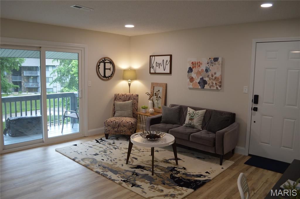 Photo of 115 Lemans Court #115, Lake Saint Louis, MO 63367 (MLS # 26000085)