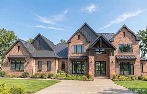 Photo of 24 Grand Meridien Forest Frst, Wildwood, MO 63005 (MLS # 26032106)