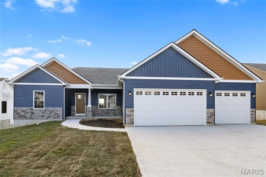 Welcome to your dream home—this stunning new construction ranch blends style, comfort, and function. The eye-catching exterior features a modern mix of vinyl and stone, paired with a spacious 3-car garage. When you step inside this gorgeous home you’ll notice the massive vaulted ceilings, unique arched doorways, cozy corner gas fireplace, and an open floor plan that’s perfect for entertaining.

The heart of the home boasts open kitchen with quartz countertops, shaker cabinets, large center island with extra seating, and a separate dining area, which is all complemented with luxury vinyl flooring throughout. You’ll certainly be the envy of your guests with extended seating on your covered deck, just outside the dining area! It’ll be your favorite hang out space. You have 3 bedrooms and 2 full baths on the main level, with plenty of room for your family, and extra room to grow in the spacious walkout basement! 

We can’t forget the gorgeous en-suite that boasts coffered ceilings, huge walk-in closet, double sink vanity that also has quartz countertops, tub, & separate shower/toilet room.

Main floor laundry room is right next to the en-suite for your convenience.

Don’t miss your chance to own this beautifully crafted ranch in Hillsboro—where modern design meets everyday comfort!