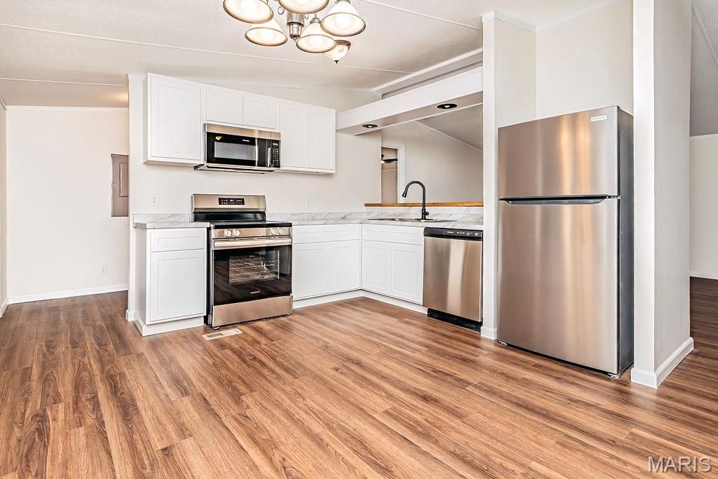 Photo of 2501 Parthenon Drive, De Soto, MO 63020 (MLS # 26013391)